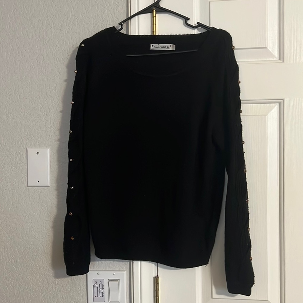 Cute black sweater with studs on sleeves